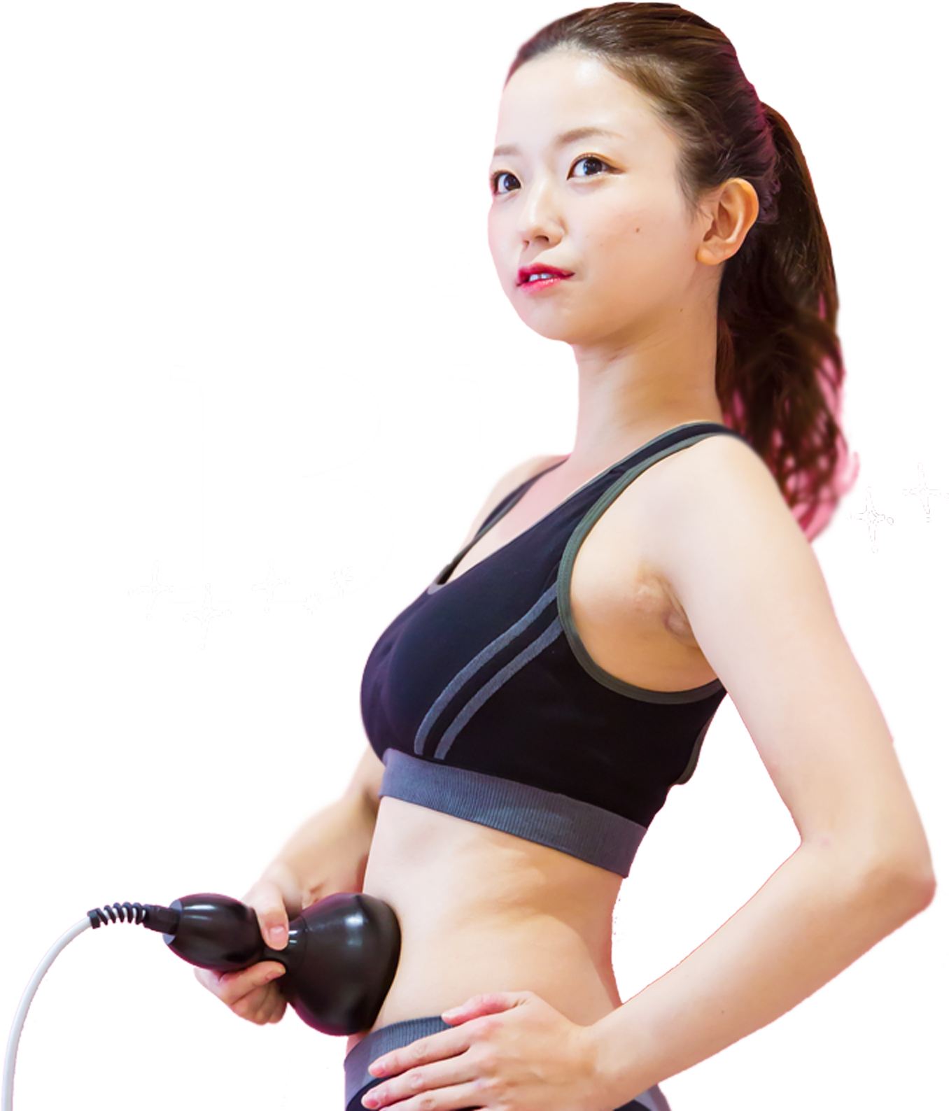 腹部にマシンをあてる女性